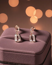 Rose Gold Dangling Loop Earrings – Stylish Silver Party Earrings