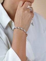 925 Silver Twisted Wave Bangle – Diamond-Cut CZ Detail | Rajasi Silver